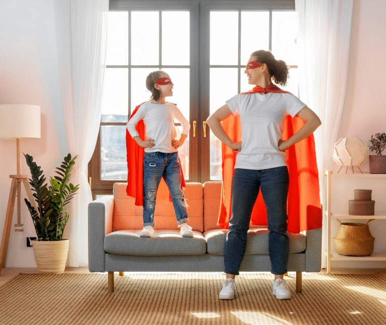 Family in Superhero costumes